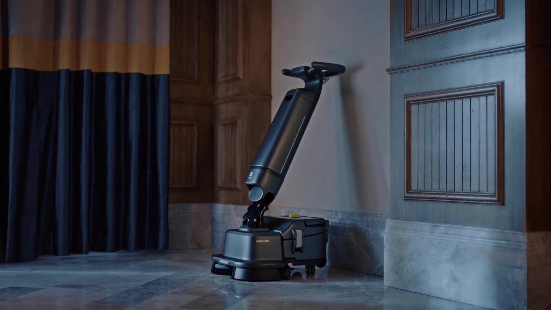PUDU SH1 upright scrubber dryer cleaning a restaurant floor